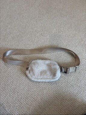 lululemon athletica Fuzzy Mini Belt Bag in Cream/Tan